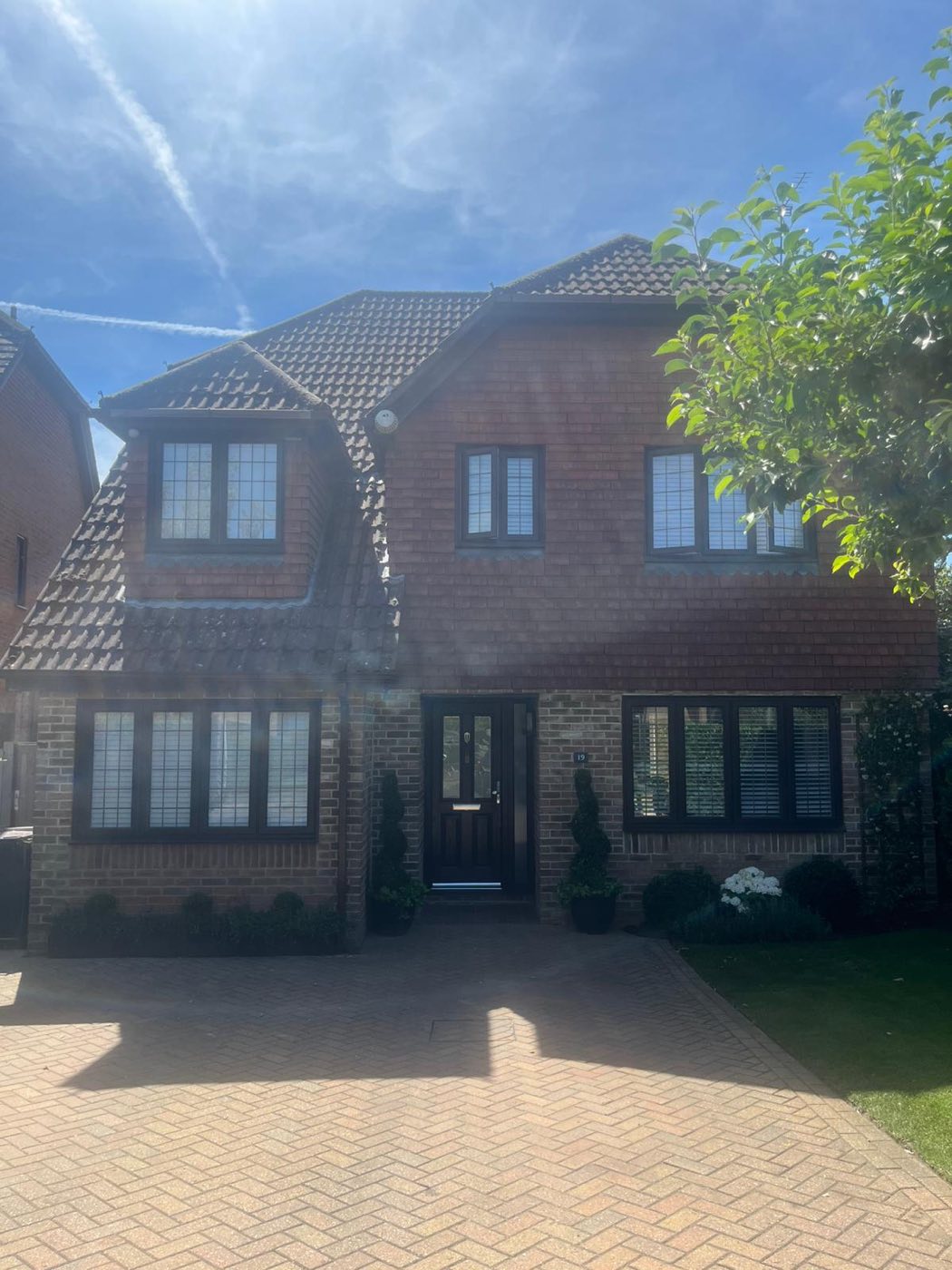 Front elevation of the house after the garage conversion