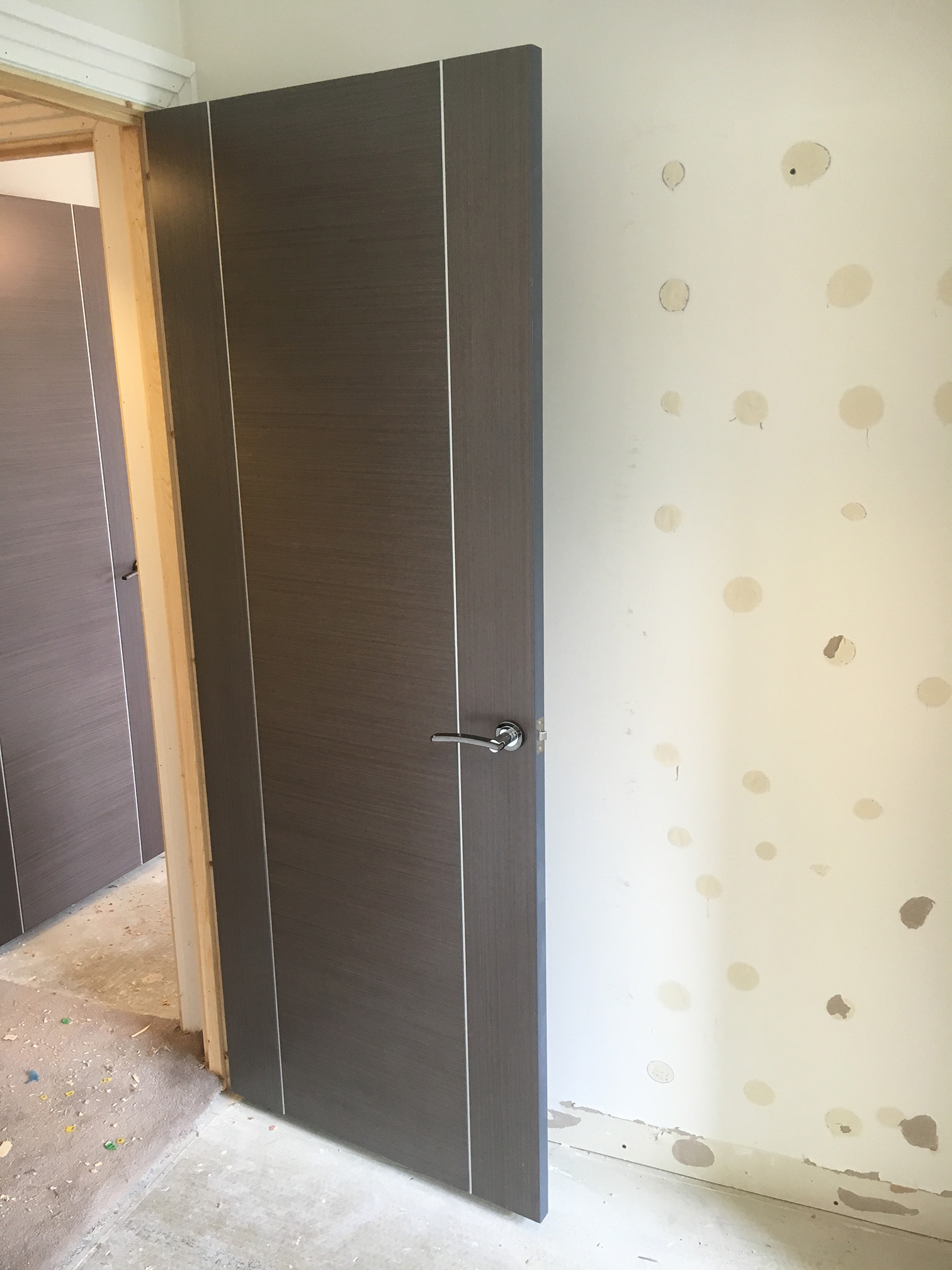 Multiple doors replaced along hallway